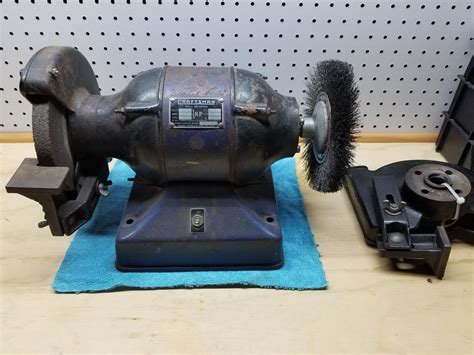I doubt you can find parts from Sears, and they'd charge $12 . . Vintage craftsman bench grinder parts